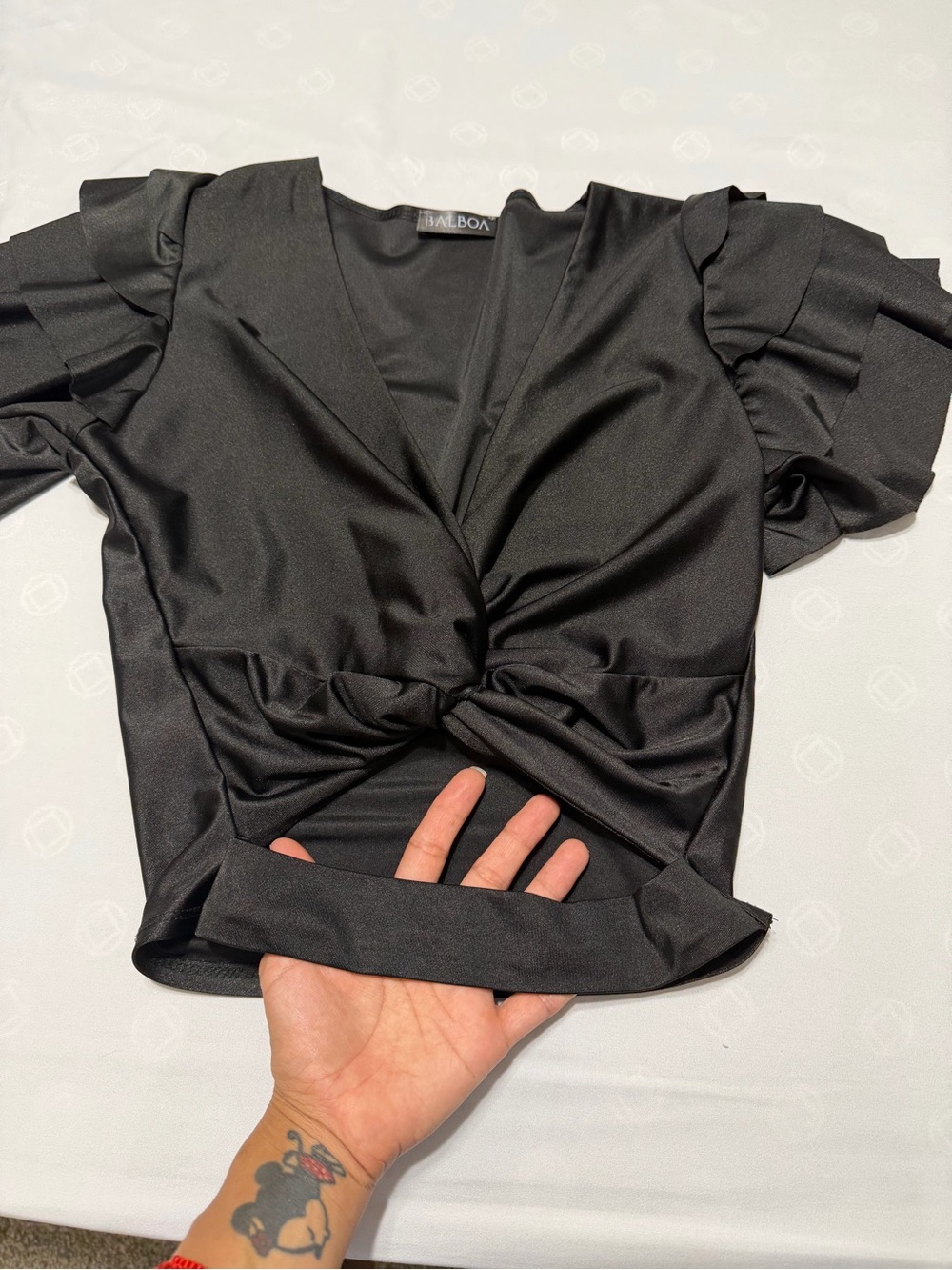 Black Ruffle-Sleeve Twist Front Blouse by BALBOA